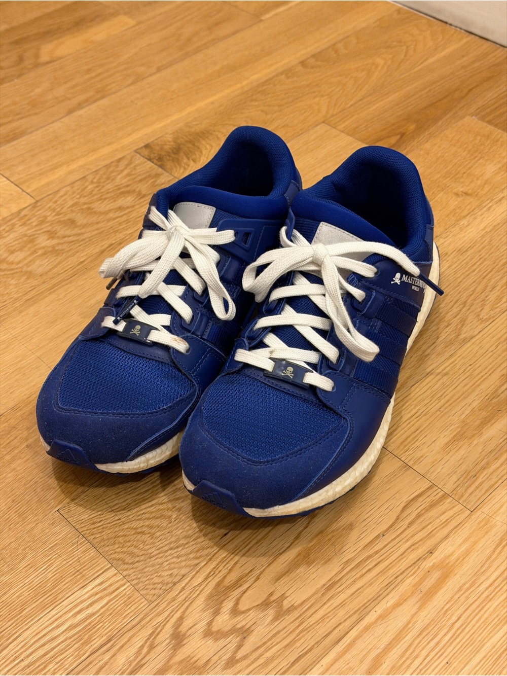 Adidas x Mastermind World EQT Support Ultra sneakers in a "Mystery Ink" blue